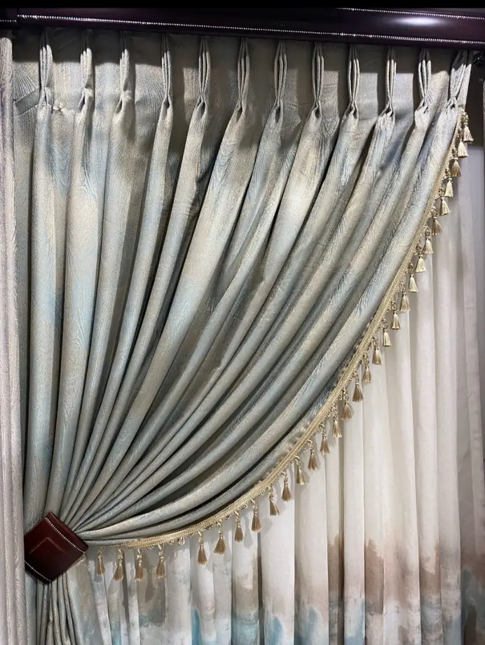 Blockout and sheer curtains layered together