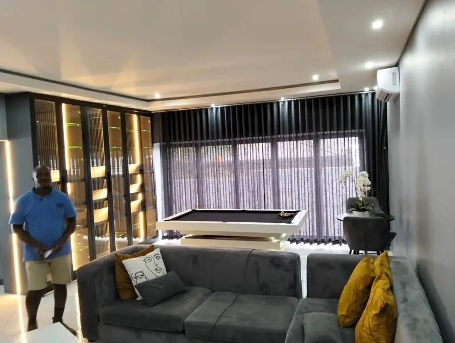 Motorised wave curtains installed by Charies Curtains